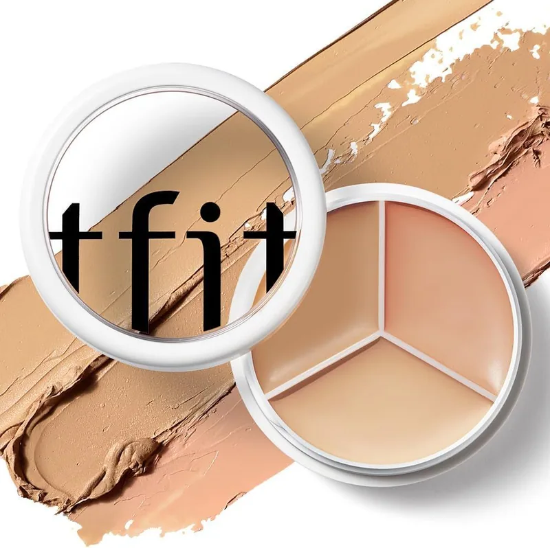 TFIT 3 Color Concealer Palette in 02 Warm, open on smears of its three colors