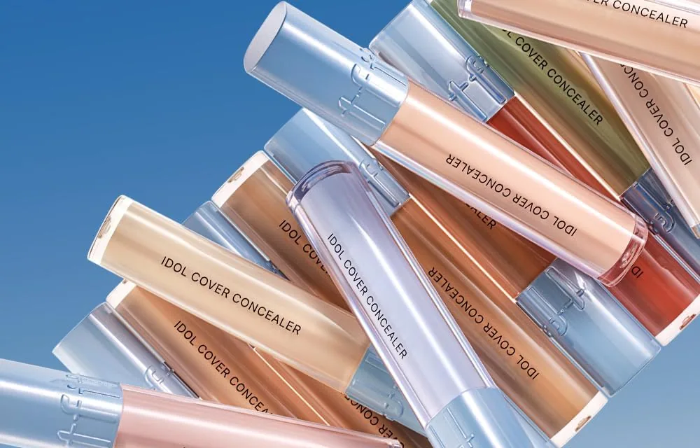 TFIT Idol Cover Concealer tubes in several shades laid across each other