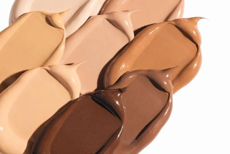 Smears of TFIT Sleek Fit Cover Foundation from ivory to deep brown